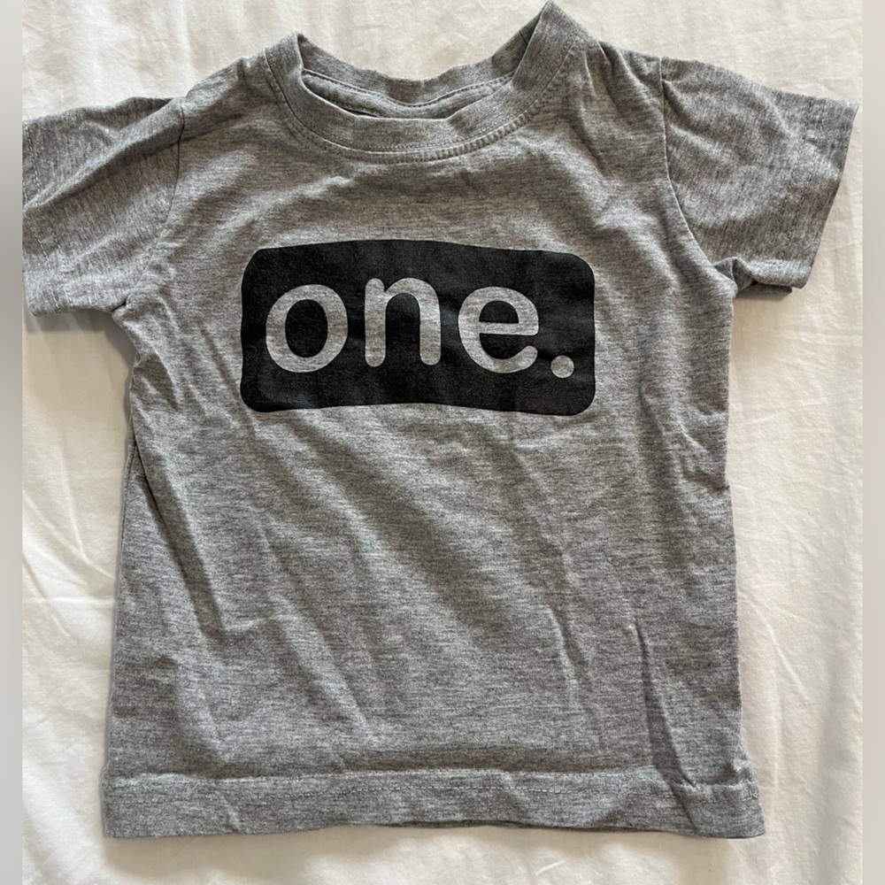 NWOT Baby’s first birthday “one” shirt
